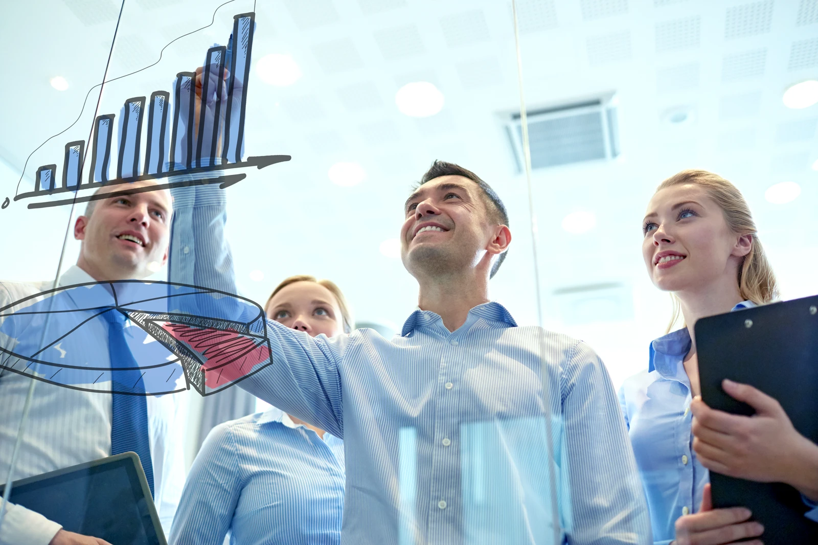 Corporate leadership team evaluating data charts and financial analytics during a boardroom meeting