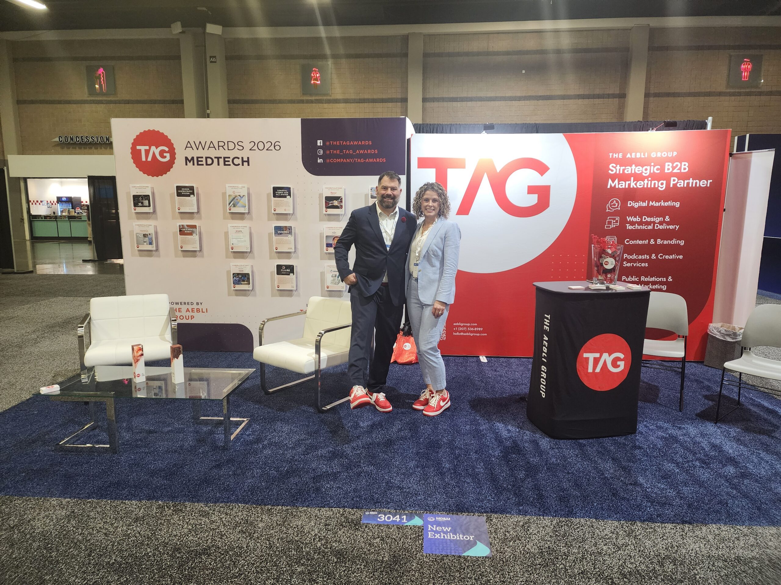 Exhibition booth featuring digital marketing service banners