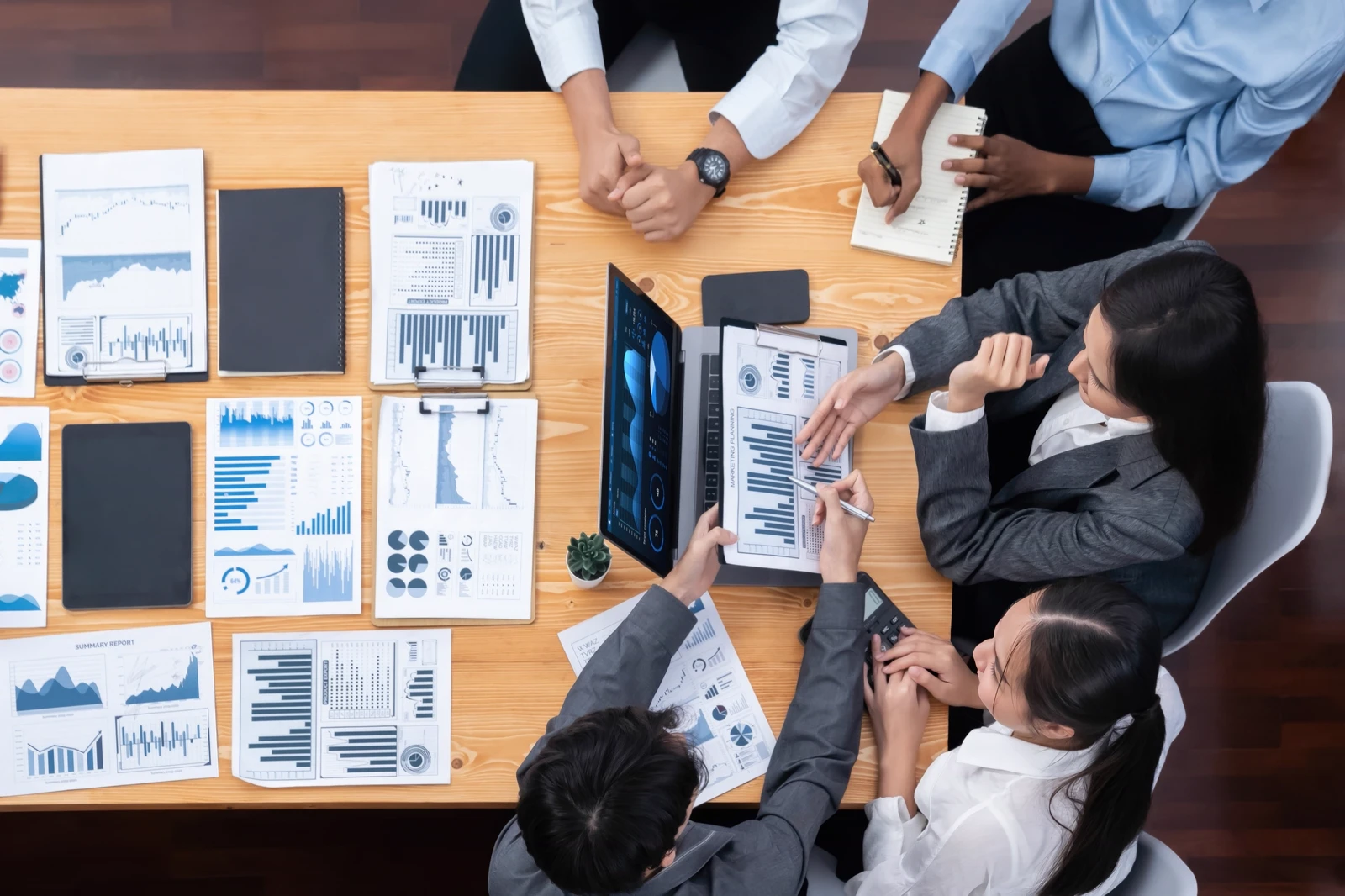 A group of people planning for newsletter strategy